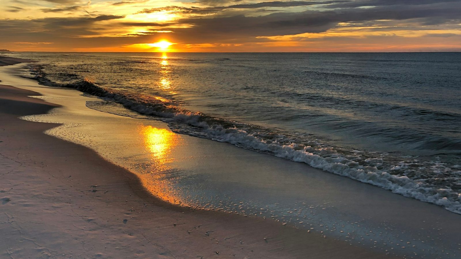 Sunset over the Fort Walton Beach shoreline near Mary Esther, Florida