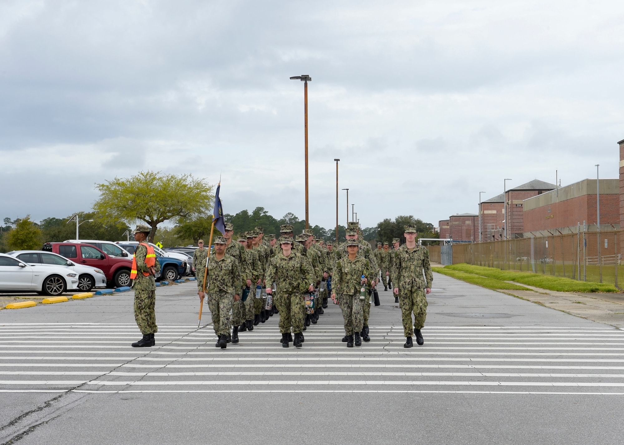 Sailors marching in formation at Information Warfare Training Command Corry Station
