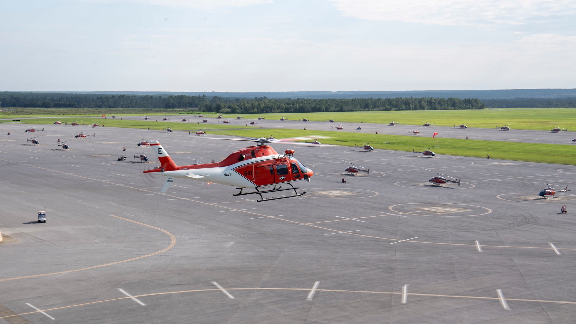 A TH-73A Thrasher helicopter arriving above the helicopter training field at NAS Whiting Field